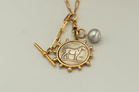 Long Equestrian Medallion with T Bar and Pearl Necklace
